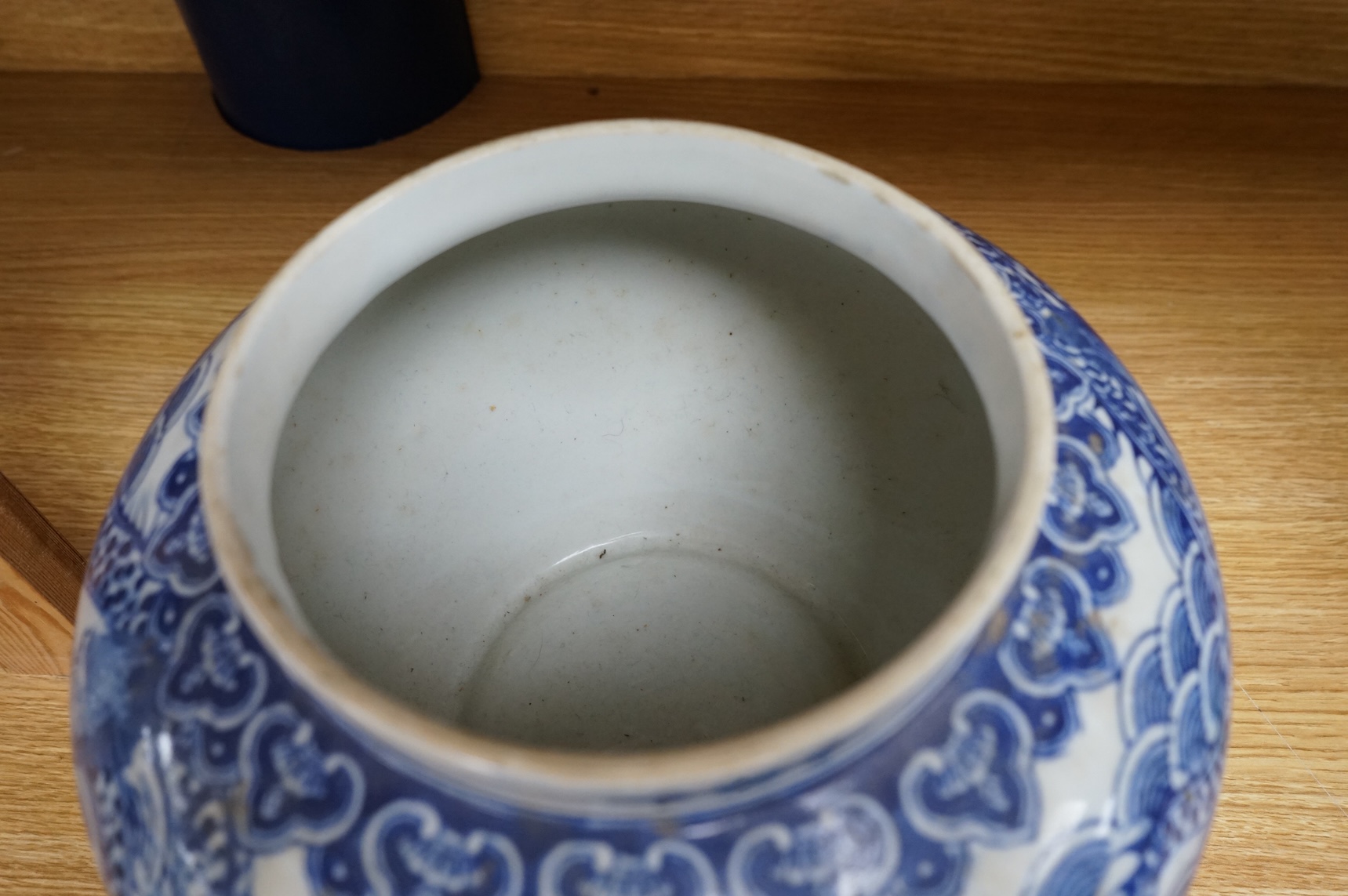 A Chinese blue and white ‘dragon’ bowl, 19cm high